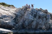 kornati and telašćica boat tour people on the cliff