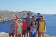 family on cliffs on kornati boat tour
