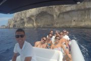 guests in a speedoboat near Kornati cliffs