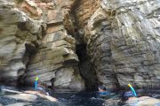 people snorkelling in fromt of golubinka sea cave on dugi otok