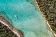 aerial view of a speedboat in a lagoon on silba and olib boat tour