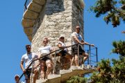people climbing the tower on silba island