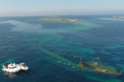 boat tours to sunken ship and people snorkeling on shipwreck
