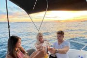 toasting with wine on a sunset boat tour