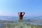 dugi otok private boat tour girl swimming in crystal-clear sea