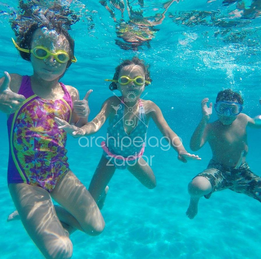 Family boat trip snorkeling