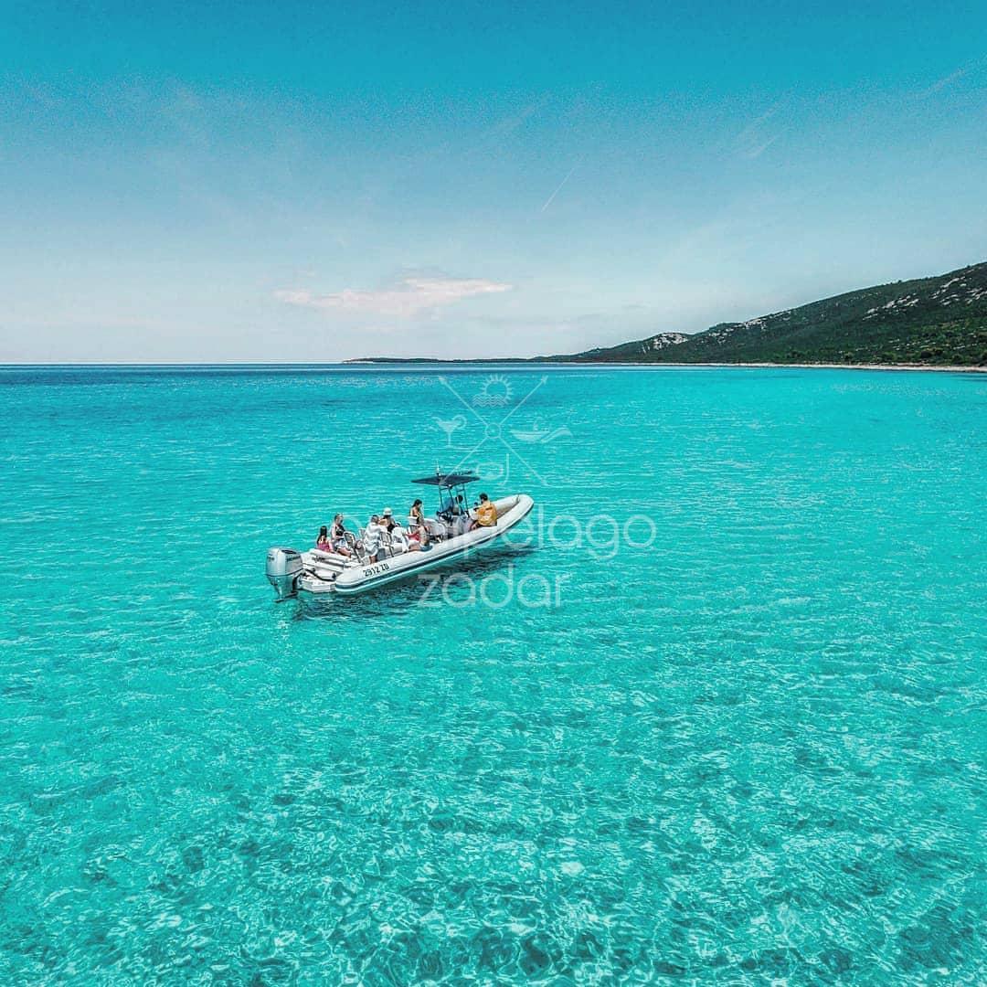 boat anchored in veli žal bay