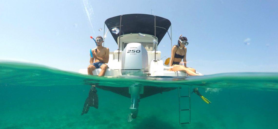 snorkeling spots in zadar guests sitting on a boat with snorkeling gear