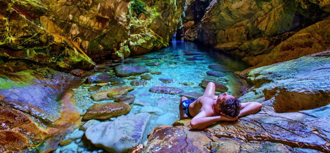 guy enjoying in the Golubinka sea cave dugi otok boat trip