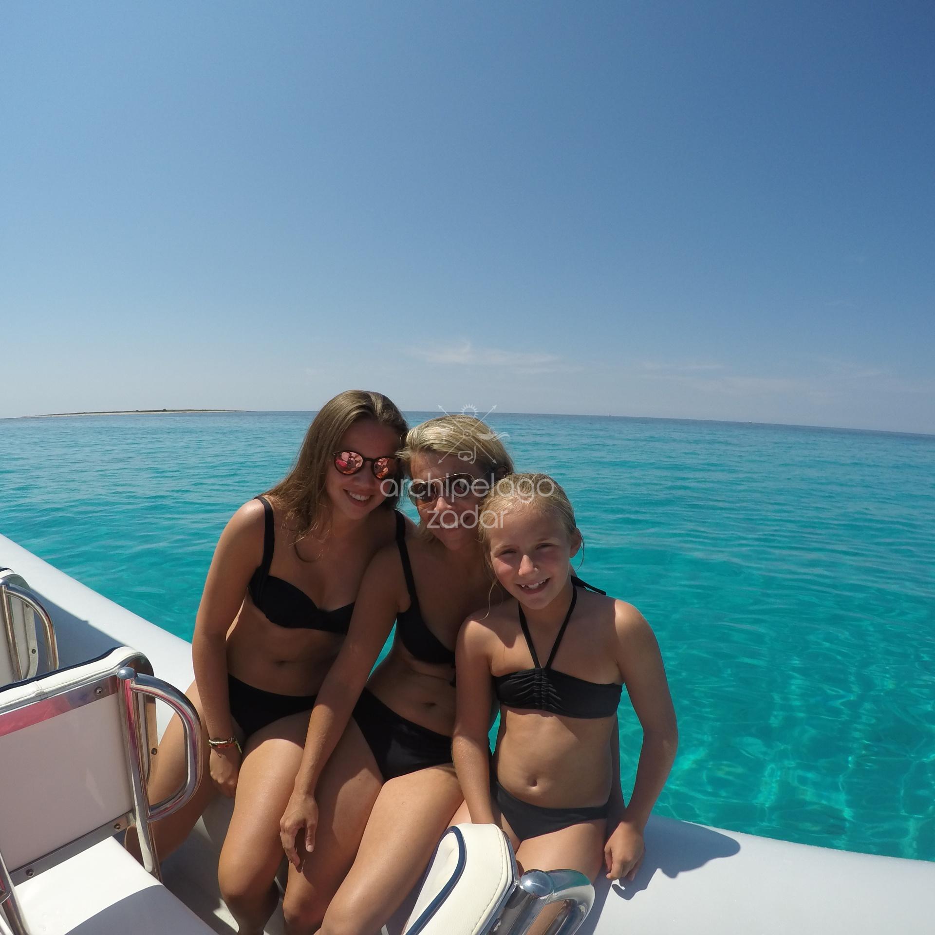 family on a speedboat