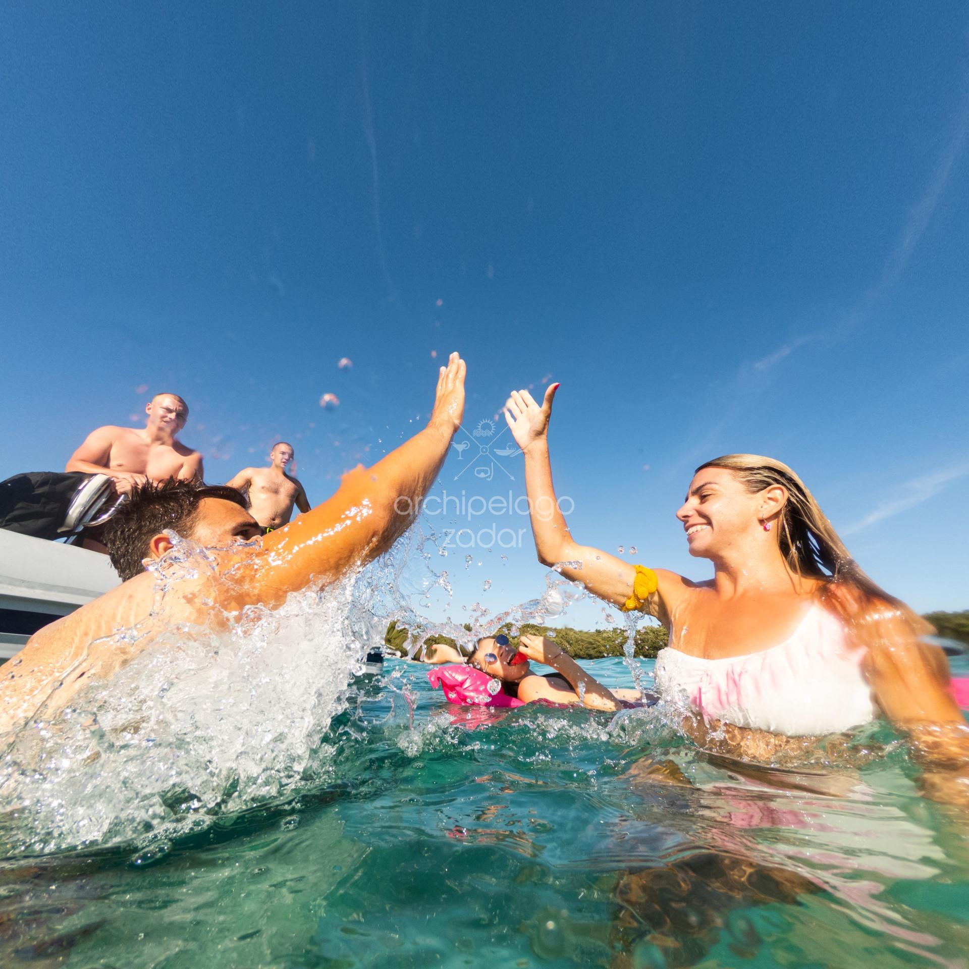 people enjoying in the sea 