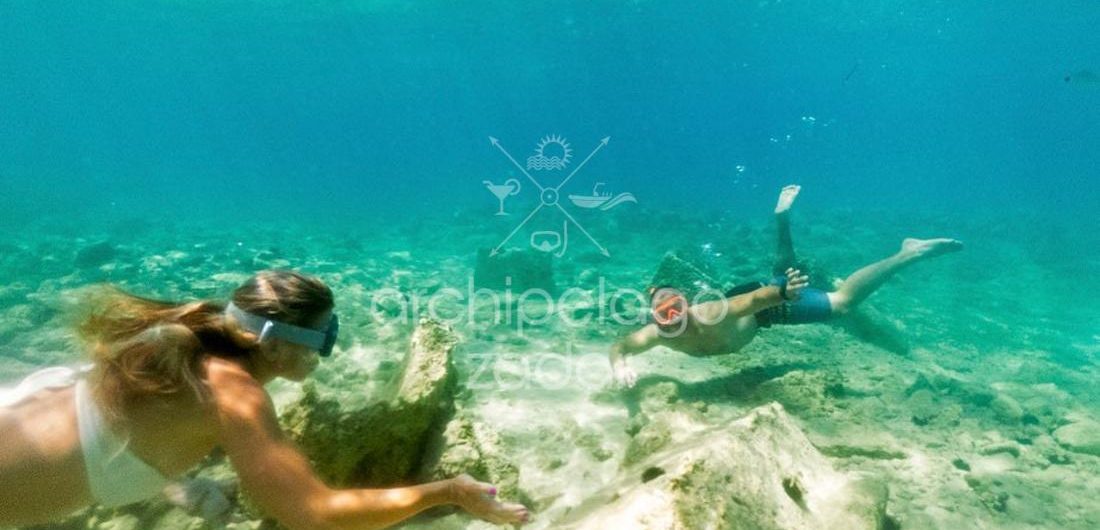 guy and girl snorkeling on silba island