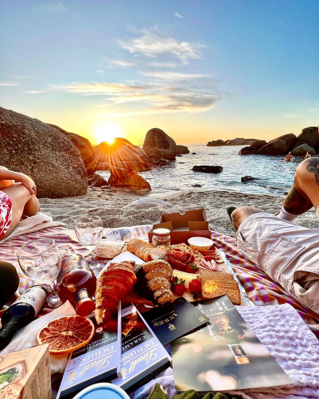 A quaint beach picnic with a slow sunset